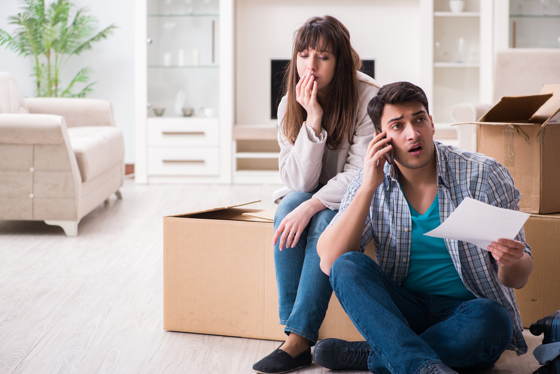 Young Couple Receiving Foreclosure Notice Letter